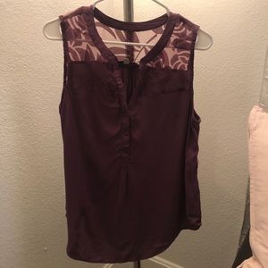 Sleeveless purple blouse